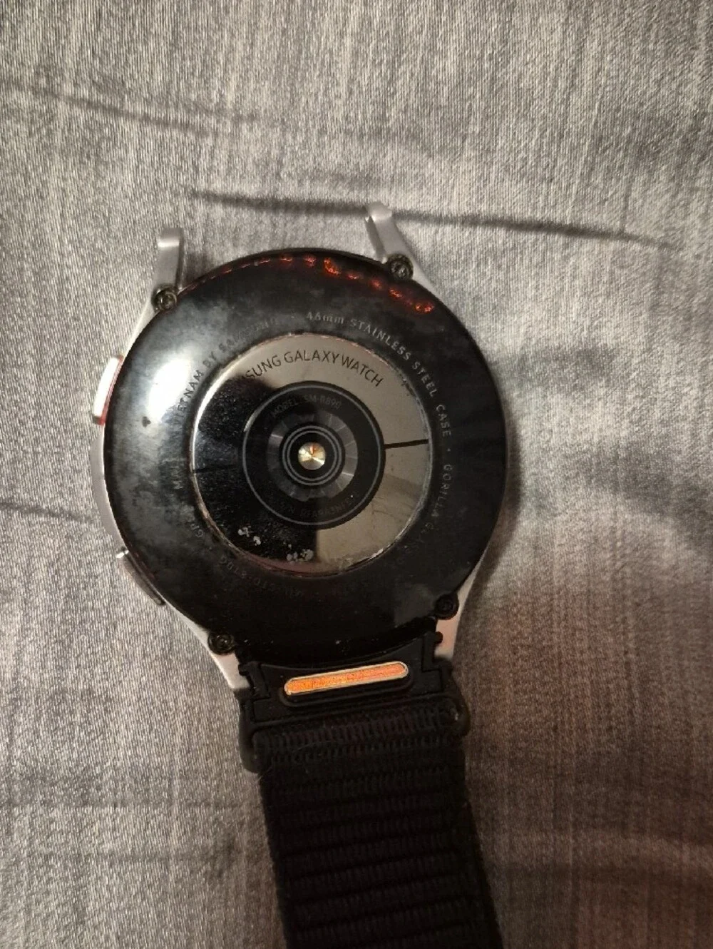 Samsung GALAXY Watch 4 Classic With Silver Shell, Velcro Wristband, and Charger